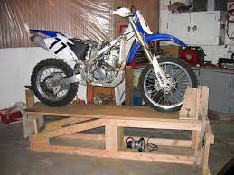 Kick the flap in so it forms the rest of the box shape and holds the top from tilting back down. Motorcycle Table By Dr Evil Homemade Motorcycle Table Constructed From 7 2x4s 1 2x6 And 1 1 8 Plywood The Motorcycle Lift Bike Repair Motorcycle Garage