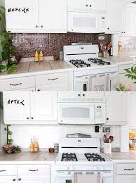 Center and secure the tile stencil with a level and painter's tape. How To Paint A Tile Backsplash Jessica Brigham