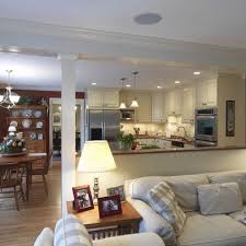 Even small kitchens can have open shelves—if you're okay with devoting space to openly showing off your pottery rather than more essential items. Half Wall Design Pictures Remodel Decor And Ideas Living Room Remodel Wall Between Kitchen And Living Room Open Kitchen And Living Room