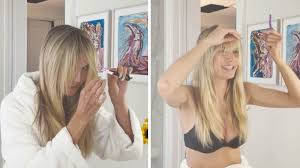 She has appeared on the cover of the sports illustrated swimsuit issue and in 1999 became the first german model to become a victoria's secret. Watching Heidi Klum Cut Her Own Bangs Is A Journey Glamour