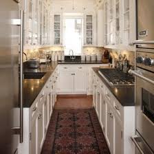 Some galley kitchens have been remodeled to remove a wall and create a bar area with seating on one side of the kitchen. Galley Kitchen Design Ideas Photos