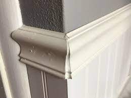 This tall, craftsman wainscoting is very easy and inexpensive to install yourself. Chair Rail Too Close To Light Switch