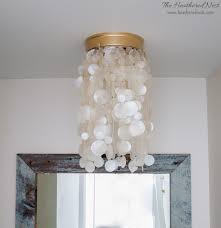 Crazy for capiz shell lamps | beach house. Diy Capiz Shell Chandelier From Julie S House