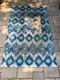 Scrub the area with a combination of one part bleach and two parts water. How To Clean An Outdoor Rug Without Bleach Average But Inspired