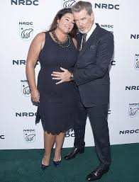 The irish movie actor was born in drogheda, ireland on may 16, 1953. Pierce Brosnan S Busty Wife Keely Nearly Spills Out Of Plunging Swimsuit On Italian Beach Celebrity News Showbiz Tv Express Co Uk