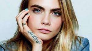 Just one week after getting her lion on her pointer finger, delevingne had her initials tattooed. Cara Delevingne S 26 Tattoos Their Meanings Body Art Guru