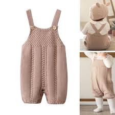 I would predict that when the leg is 6 long, you'll put the stitches onto a holder while you knit the other leg with the shaping reversed. Knitted Baby Romper Little Palace Store