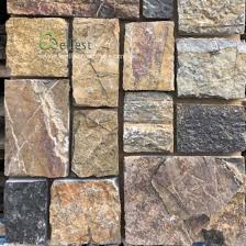 Applying natural thin stone veneer filling & finishing joints. China Different Limestone Wall Stone Exterior Wall Decor Stone Brown Stack Stone China Stone Cladding Stone Veneer