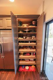 Looking for where to buy surplus unfinished kitchen cabinets for your home? This Pantry Features Our Springfield Maple Creekstone Cabinets Kitchen Organization Pantry Kitchen Organization Rustic Kitchen Design