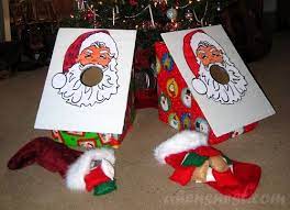 I Like The Idea Of A Bean Bag Toss Game But I Would Alter It To Have A Picture Of Santa With His Sack The Christmas Carnival Xmas Party Games