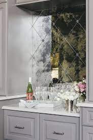 I wasn't really up for ordering a custom mirror to get the exact size we needed. Mirrored Diamond Pattern Bar Backsplash Tiles Transitional Kitchen