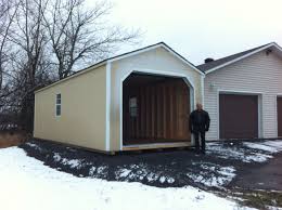 12 X 28 Wooden Portable Garage Delivered Fully Assembled And Ready For Immediate Use Visit Northcountrysheds Com For More Amish Sheds Shed Prefab Garages