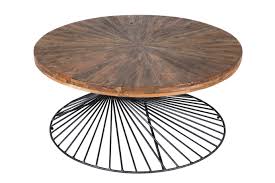 Coffee table with black chromed or black or titanium embossed lacquered steel base and curved clear or fumè glass top. The Urban Exotic Guide Enigma Magazine