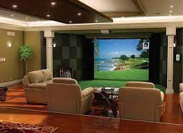 High Definition Golf Simulator Also Becomes Your Home Theater Golf Simulators Golf Simulator Room Golf Room