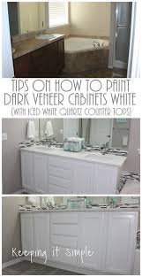 Tips On How To Paint Dark Veneer Cabinets White With Iced White Quartz Counter Tops White Bathroom Cabinets Painting Bathroom Cabinets White Quartz Counter