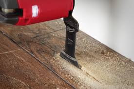Using a dead blow hammer, carefully tap on the block to close the gap between the two pieces of laminate flooring. Milwaukee Oscillating Multi Tool Blades Pro Tool Reviews