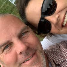 Gravenhurst Neighbors Cheer On Bicycle Rider As Winter Ends