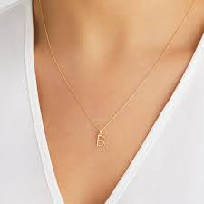 Tiffany charms are memorable gifts that can be personalised with engraving. Solid Gold Initial Letter Necklace Lily Roo