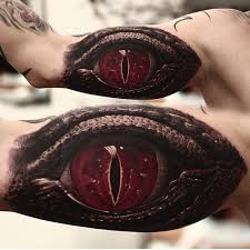 Snake eyes tattoos snake snake tattoo tattoo designs pieces indian wolf design eye tattoo. 22 Reptile Tattoos On Sleeve