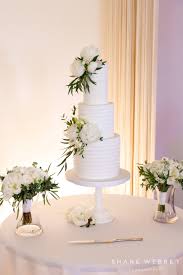 Not only is this floral wedding cake dripping in white flowers, but it's also resting on an entire garden's worth of blooms. Wedding Cake Ideas Best Wedding Cakes 2021