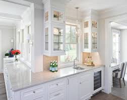 Since china cabinet and kitchen cabinet shelves are supported at numerous points and normally carry light objects, 3/16″ or 1/4″ glass is recommended. Lighted Glass Front Cabinets With Glass Shelves Transitional Kitchen