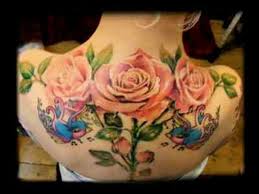 Blue Bird And Rose Tattoo Pink Roses And Blue Sparrow Tattoo Vines Thorns Blue And Pink Bird Realistic Rose Tattoo Beautiful Flower Tattoos Rose Tattoos