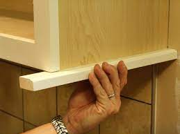 This beaded light rail features two grooves either side of a central bead and can be installed under wall cabinets to hide under cabinet lighting and create a custom furniture finish. How To Install A Kitchen Cabinet Light Rail How Tos Diy