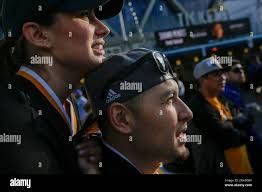 Alyssa Sanchez of Alameda rests her chin husband Ulices Sanchez as they  watch Game 6 of the NBA Finals between the Toronto Raptors and the Golden  State Warriors outside Oracle Arena in