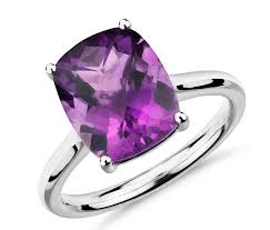 The garnet stone ranges in colors, it's most commonly a medium to dark red color, however it can vary between pink and dark red, almost black. February Birthstone Amethyst Buying Guide Gift Ideas