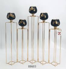 Stsuneu gold candle holders, 2pcs nordic style single head decorative candlestick holder home decor metal candle holder for valentine's day, table, wedding, dinning, party, bar (l) 4.2 out of 5 stars. 52208ga 52208gb Iron Candle Holder Gold And Black Color Wholesale