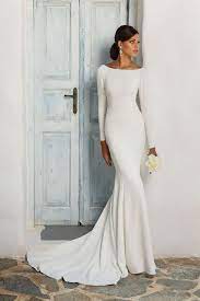 White Flower Bouquet Chiffon Wedding Dress Long White Dress Wooden Door Black Hair In In 2020 Wedding Dress Long Sleeve Wedding Dresses Form Fitting Wedding Dress