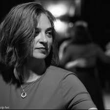 A visitor playing in the sprinkler...