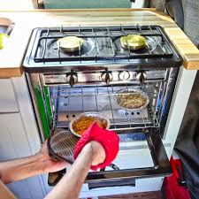 The key to making a good one is to create a way to heat the box and to control the amount of heat. Cooking In A Campervan Camp Chef Portable Oven Review
