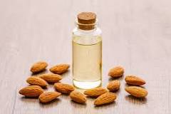 Is almond extract made from peach pits?