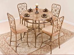 Brown Pretty Wrought Iron Kitchen Table With Round Table Four Chairs And Stylish Rug Decoracion De Comedor Mesa Y Sillas Silla De Hierro