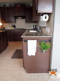 Use A Towel Rack On The End Of Your Cabinet To Hang Towels Hook Pots Or Herbs Kitchen Rails Home Decor Home