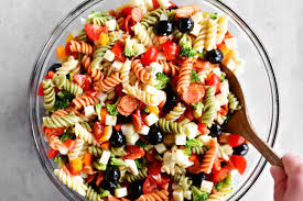 In large bowl, combine rotini and remaining ingredients except dressing. Italian Pasta Salad The Gunny Sack
