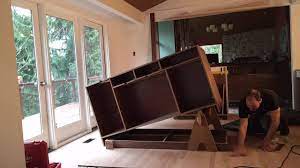 Some of the same principles apply, like how to attach one cabinet to another, but the process of attaching the cabinets securely to the floor must be done differently to ensure your island does not move. Installing An Island Youtube