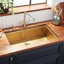 Custom designed to fit perfectly with the austen vibe collection and the ward farmhouse fireclay kitchen sinks, this bottom grid will protect your sink's surface from scrapes and scratches while also protecting fragile dishes from breaking. 32 Atlas Stainless Steel Undermount Kitchen Sink Matte Gold