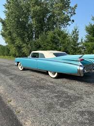 Image result for Silver 1959 Cadillac