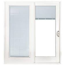 Most doors don't have enough depth, so you'll have to install the window treatment on the wall. Blinds Between The Glass Sliding Patio Door 60 X 80 Patio Doors Exterior Doors The Home Depot