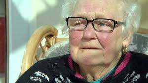 Eileen Gould in tears as fundraising cheque handed over