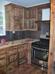 Even if your kitchen is newly built, you can decorate to achieve an old timeworn appearance and make the heart of your home a really cozy space. Kitchen Remodeling Project Barn Wood Cabinets Rustic Kitchen Cabinets Farmhouse Kitchen Decor