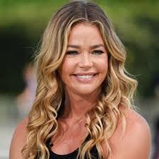 Denise Richards reveals 9-year-old daughter said 'dad' for first time