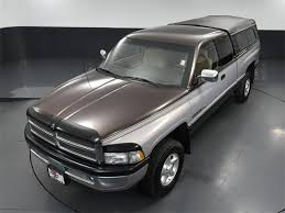 Image result for Medium Driftwood 1997 Chrysler