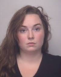 Police: Woman resists arrest with child in car