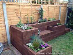 Recycled pallet vertical garden with pots. 31 Best Diy Garden Pallet Projects