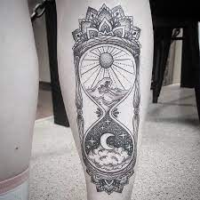 50 Meaningful And Beautiful Sun And Moon Tattoos Kickass Things Hourglass Tattoo Half Sleeve Tattoo Feather Tattoos