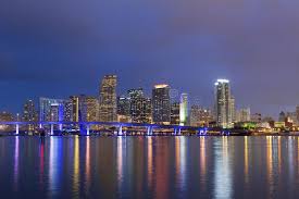 City Of Miami Image Of Miami Skyline And Reflection Of The City Lights During T Sponsored Skyline Reflect Miami City City Lights At Night Miami Skyline
