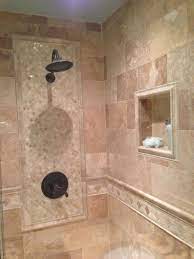 You can find the most incredible designs and color combinations with mosaic. Pictures Of Bathroom Walls With Tile Walls Which Incorporate A Tile Design Set In In The Main Shower Wall Shower Tile Shower Tile Designs Shower Wall Tile